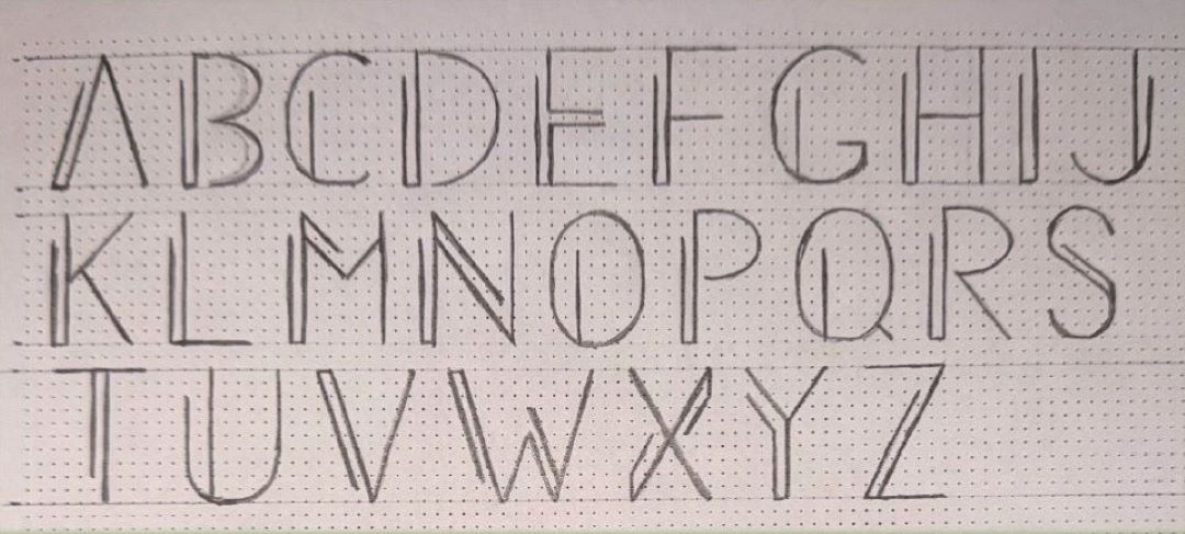 Clean geometric sketches on dotted paper of each letter of the alphabet.